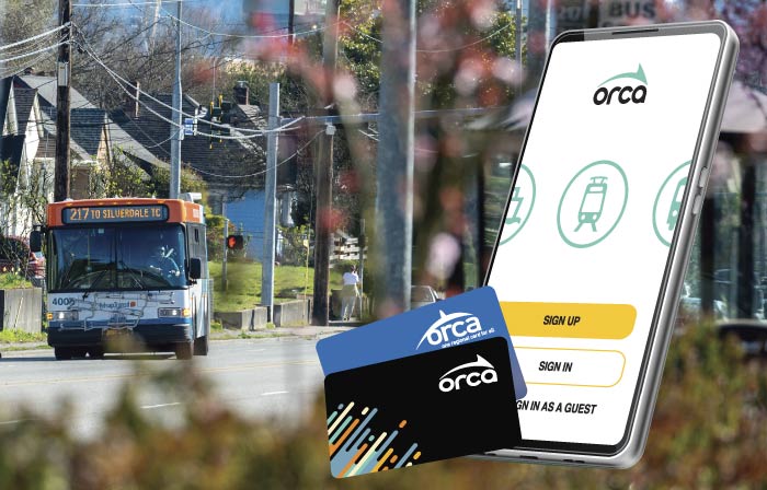 myORCA app image of phone and a bus coming up a street. 